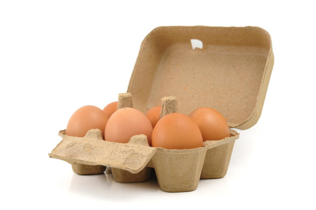 A small egg carton with eggs in it - can you compost egg cartons?
