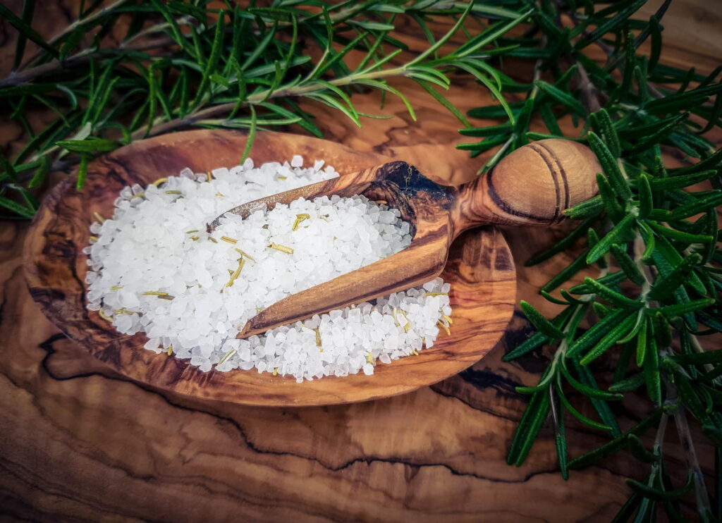 white rice on brown wooden spoon - can you compost rice?
