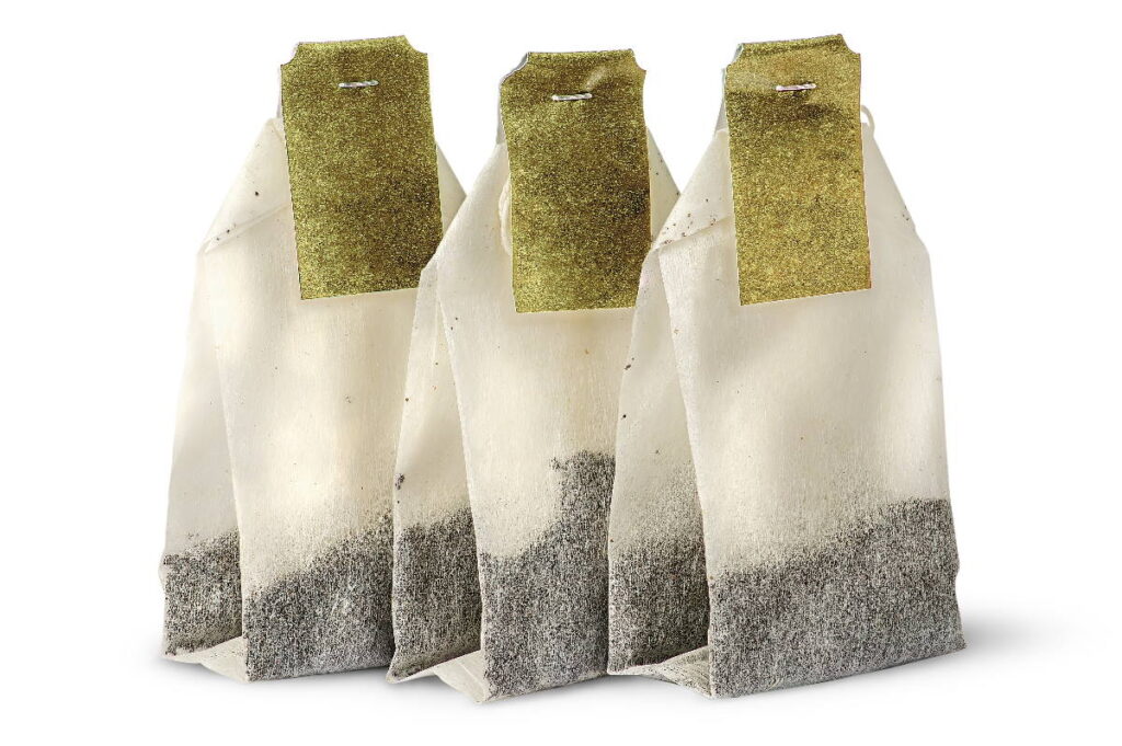 Three tea bags with labels - Can you compost tea bags and tea?
