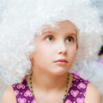 little girl in white wig - don't compost fake hair in a wig