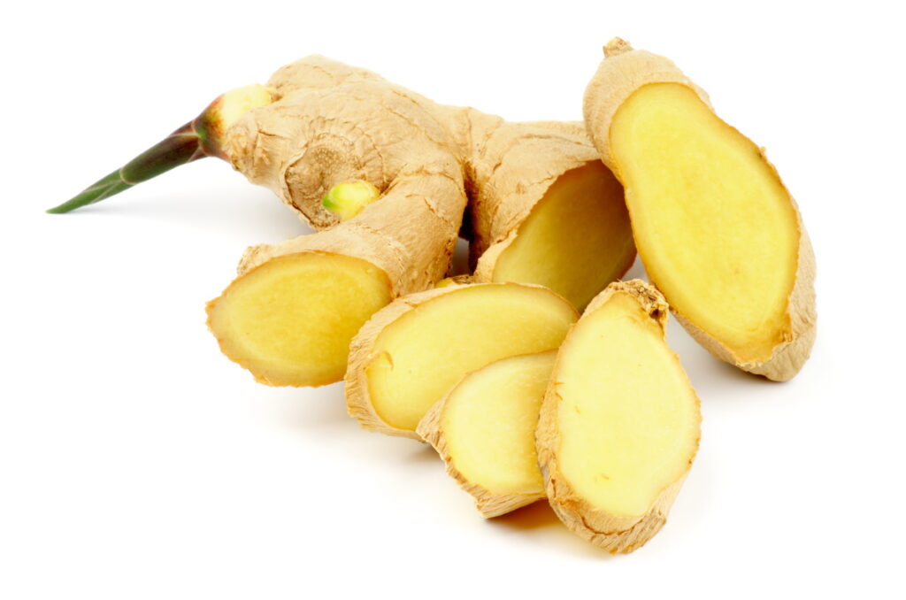 cut up ginger on white background - can you compost ginger